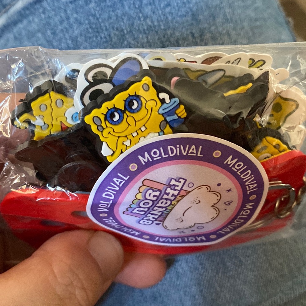 SpongeBob croc charms, stickers, and a keychain